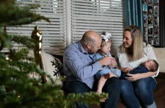 Family together at Christmas while choosing thoughtful Christmas gifts for Dad