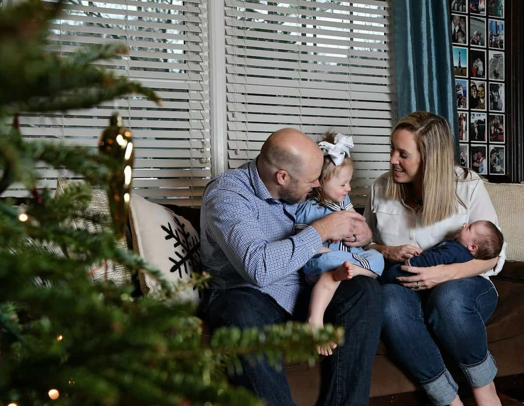 Family together at Christmas while choosing thoughtful Christmas gifts for Dad